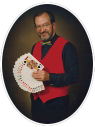 Russell King, magician, with playing cards